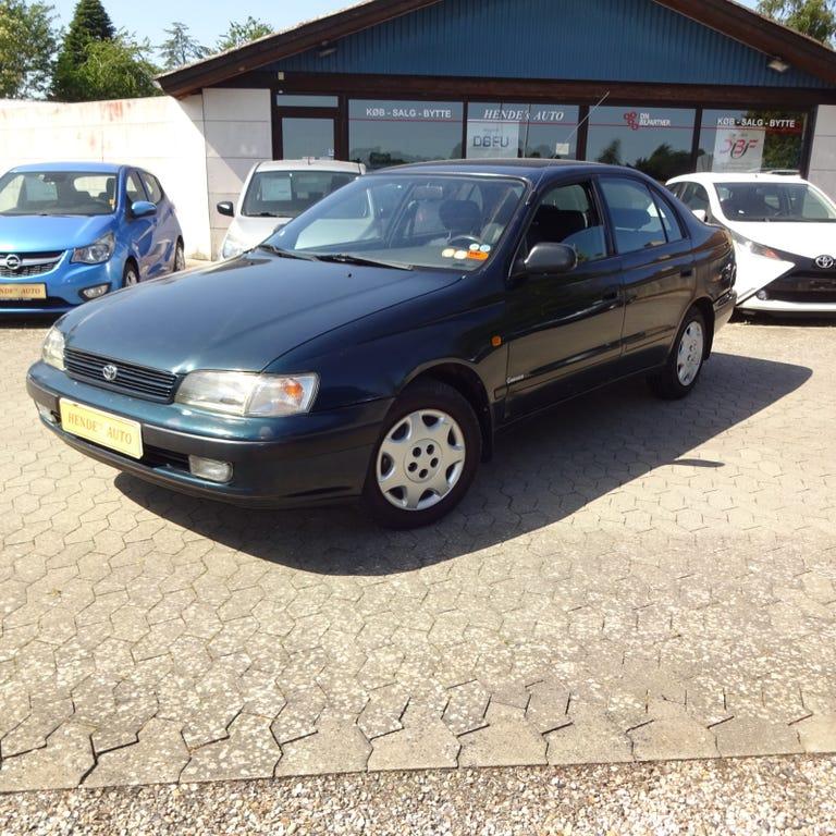 Toyota Carina E 1,6 XLi Commander hos Hendes Auto