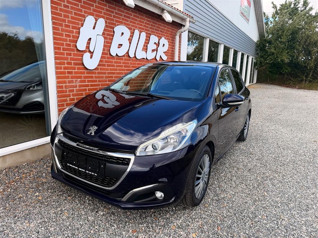 Peugeot 208 1,2 PureTech Signature Sky 82HK 5d hos H.J. Biler